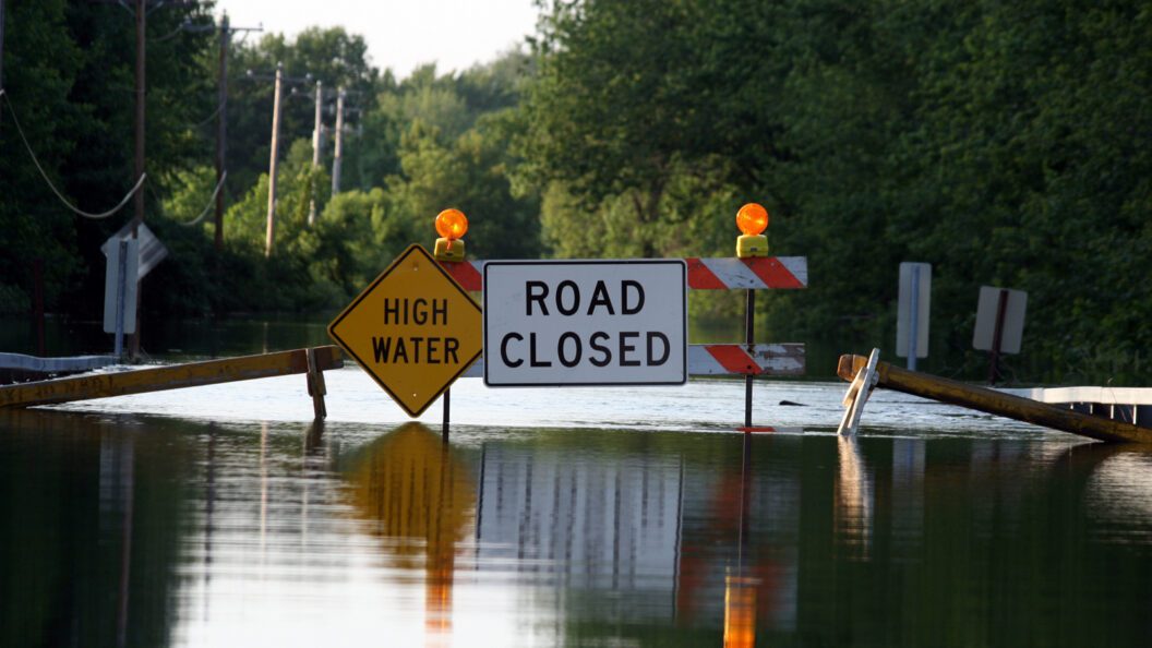 Picture: Flooded Road with High Water and Road Closed Sign