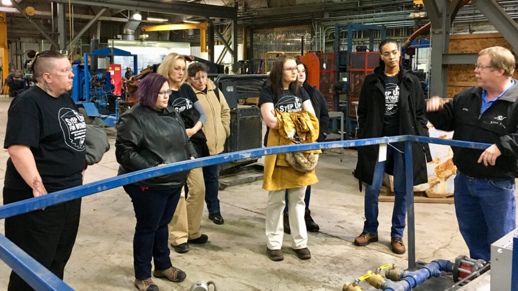 Step Up for Women participants learn about our Fabrication Shop at our Huntington, West Virginia, branch. Here they are inspecting a packaged pump system. 